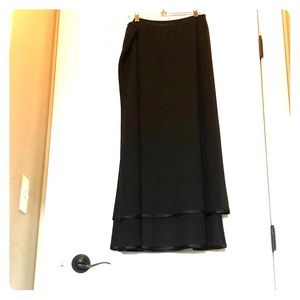 Black dressy long skirt with layered hem.